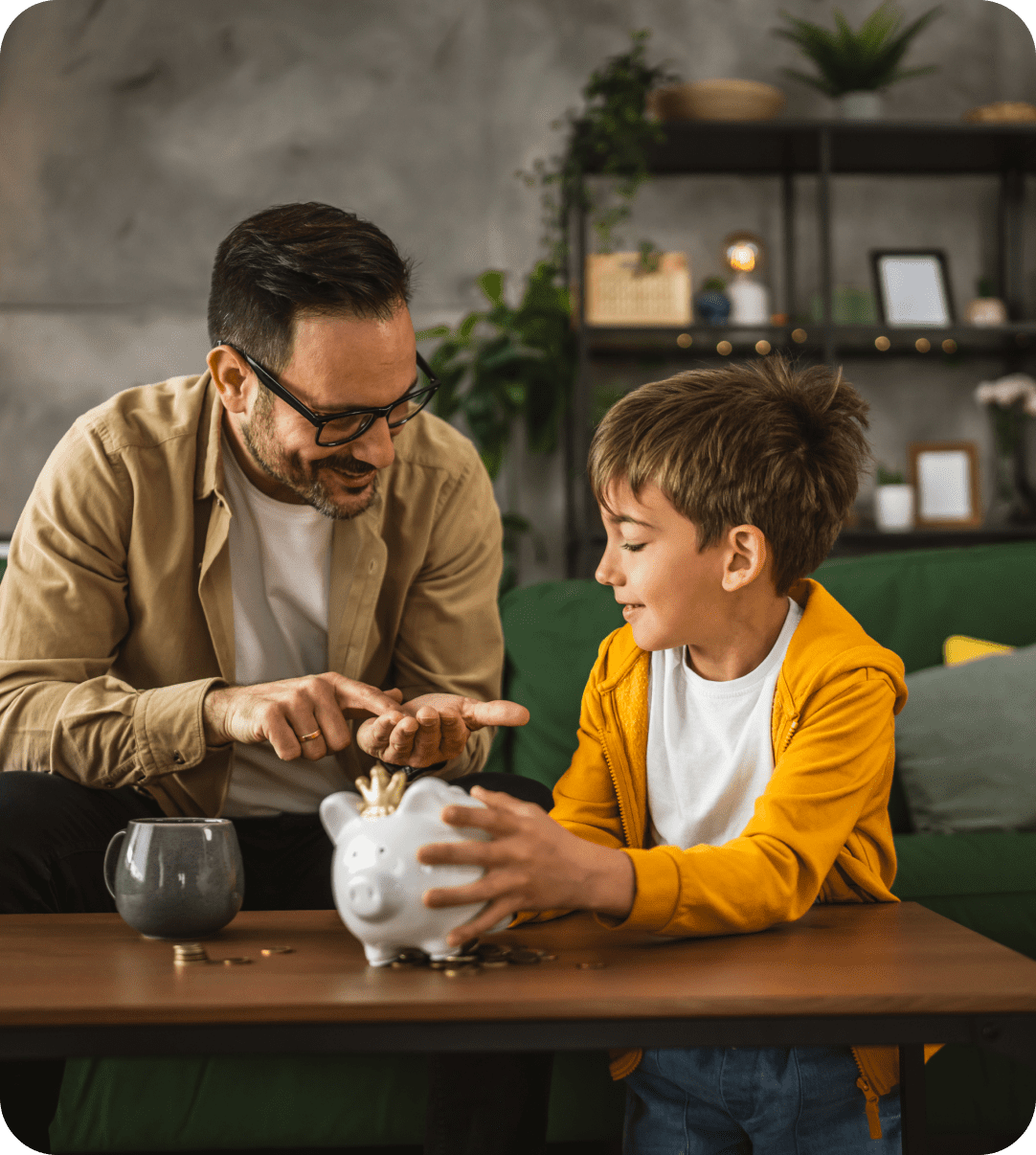 A man and boy are sitting at the table