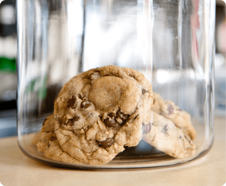 A cookie is sitting on top of the table.