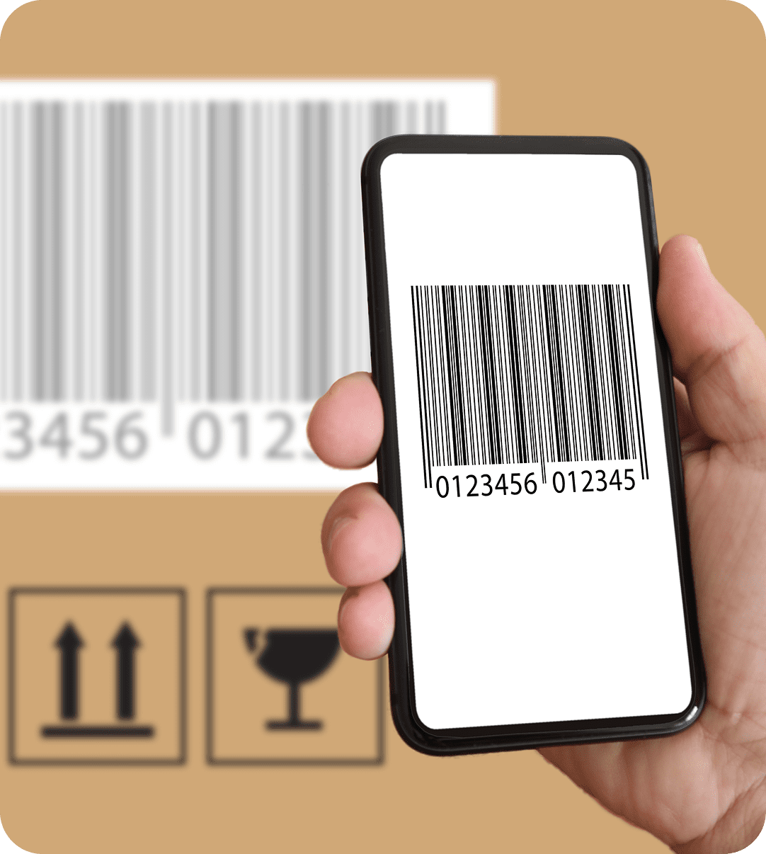 Hand holding a smartphone displaying a barcode. A matching barcode appears on a cardboard box in the background, above shipping and handling symbols.