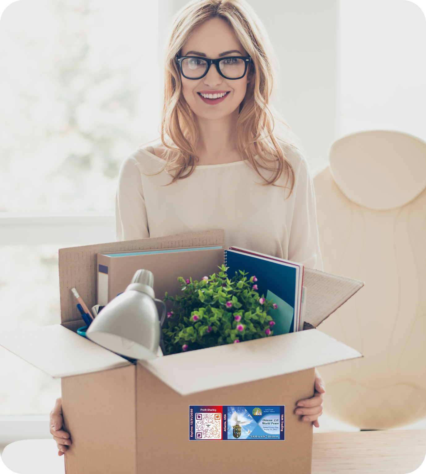 LLB Home Delivery4 A woman holding a box with plants inside of it.